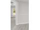 View of a bright interior with hardwood floors and an archway at 521 Mill St, Smithfield, NC 27577