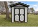 White and black storage shed in backyard at 521 Mill St, Smithfield, NC 27577