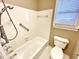 Bathroom with a shower/tub combo and updated fixtures at 5718 Sentinel Dr, Raleigh, NC 27609