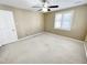 Bright bedroom with ceiling fan and window at 5718 Sentinel Dr, Raleigh, NC 27609
