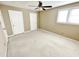 Spacious bedroom with ceiling fan and double closets at 5718 Sentinel Dr, Raleigh, NC 27609