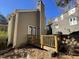 Rear view of house showing deck and part of another house at 5718 Sentinel Dr, Raleigh, NC 27609