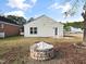 Spacious backyard with fire pit and patio at 801 Thornberry Ct, Spring Hope, NC 27882