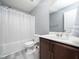 Clean bathroom with brown vanity and white toilet at 801 Thornberry Ct, Spring Hope, NC 27882