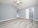 Spacious bedroom with gray walls and vinyl flooring at 801 Thornberry Ct, Spring Hope, NC 27882