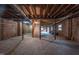 Spacious unfinished basement with exposed beams and plenty of room at 802 S Sellars Mill Rd, Burlington, NC 27217