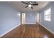 Bedroom with hardwood floors and access to bathroom and closet at 802 S Sellars Mill Rd, Burlington, NC 27217