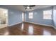 Bedroom with hardwood floors and ceiling fan at 802 S Sellars Mill Rd, Burlington, NC 27217