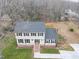 Two-story home with a charming facade and manicured lawn at 802 S Sellars Mill Rd, Burlington, NC 27217