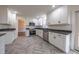 Modern kitchen with granite countertops and stainless steel appliances at 802 S Sellars Mill Rd, Burlington, NC 27217