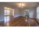 Spacious living room with hardwood floors and views to other rooms at 802 S Sellars Mill Rd, Burlington, NC 27217