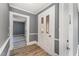 Bright entryway with hardwood floors and an interior door at 805 N Mebane St, Burlington, NC 27217