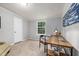 Bright bedroom with wood desk and large window at 8225 Fieldcrest Ln, Fuquay Varina, NC 27526