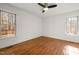 Bedroom with hardwood floors, ceiling fan and deck views at 1018 Christy Ridge Ct, Rougemont, NC 27572