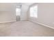 Bedroom with sloped ceilings and a large window at 11 Hazelwood Ct, Smithfield, NC 27577