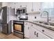 Kitchen with granite countertops and stainless steel appliances at 11 Hazelwood Ct, Smithfield, NC 27577