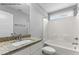 Illustration of a bathroom with granite countertop vanity and shower-tub combo at 121 Tanglewood Dr # 8-J, Louisburg, NC 27549