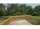 Wooden deck with railing at 121 Tanglewood Dr # 8-J, Louisburg, NC 27549