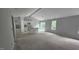 Spacious great room with ample natural light with a new sliding glass door at 121 Tanglewood Dr # 8-J, Louisburg, NC 27549