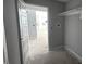 Hallway view leading to the kitchen, and closet space at 121 Tanglewood Dr # 8-J, Louisburg, NC 27549