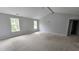 Spacious main bedroom with cathedral ceiling and natural light at 121 Tanglewood Dr # 8-J, Louisburg, NC 27549