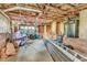 Partially finished basement with garage access, offering potential for workshop or storage at 126 Person St, Louisburg, NC 27549