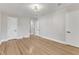 Bright bedroom with hardwood floors and neutral walls at 126 Person St, Louisburg, NC 27549