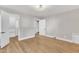 Spacious bedroom with hardwood floors and walk-in closet at 126 Person St, Louisburg, NC 27549