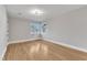 Well-lit bedroom with hardwood floors and crown molding at 126 Person St, Louisburg, NC 27549