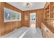 Room with built-in wooden shelving and cabinets at 126 Person St, Louisburg, NC 27549