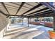 View from under carport showing backyard patio and water at 126 Person St, Louisburg, NC 27549