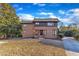 Inviting two-story home featuring a brick exterior at 126 Person St, Louisburg, NC 27549