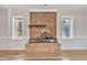 Brick fireplace in living room at 126 Person St, Louisburg, NC 27549