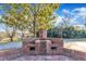 Brick grill and outdoor kitchen area at 126 Person St, Louisburg, NC 27549