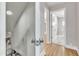 Hallway with access to bathroom and bedroom at 126 Person St, Louisburg, NC 27549