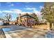 Back of the house showcasing modern updates to a classic brick home at 126 Person St, Louisburg, NC 27549