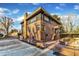 Modern brick home with a unique architectural design at 126 Person St, Louisburg, NC 27549