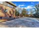 Side view of the home showcasing the landscaping and patio at 126 Person St, Louisburg, NC 27549