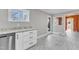 Kitchen with stainless steel appliances and white cabinets at 126 Person St, Louisburg, NC 27549