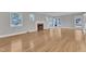 Hardwood floors and a fireplace highlight this living room at 126 Person St, Louisburg, NC 27549