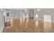 Sunlit living room with hardwood floors and fireplace at 126 Person St, Louisburg, NC 27549