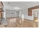 Spacious living room with hardwood floors and brick fireplace at 126 Person St, Louisburg, NC 27549
