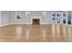 Spacious living room with hardwood floors and fireplace at 126 Person St, Louisburg, NC 27549