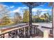 View from staircase of brick patio with fire pit at 126 Person St, Louisburg, NC 27549