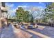 Brick patio with fire pit and pergola at 126 Person St, Louisburg, NC 27549