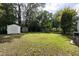 Large backyard with grassy area and shed at 127 E Ridge St, Rocky Mount, NC 27804
