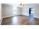 Spacious living room with hardwood floors and open concept to the kitchen at 127 E Ridge St, Rocky Mount, NC 27804