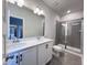 Bathroom with double vanity, large mirror, and walk-in shower at 144 Weavers Grove Dr, Chapel Hill, NC 27514