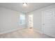 Bedroom with carpeted floor and access to bathroom at 144 Weavers Grove Dr, Chapel Hill, NC 27514