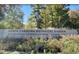 North Carolina Botanical Garden sign surrounded by lush greenery at 144 Weavers Grove Dr, Chapel Hill, NC 27514